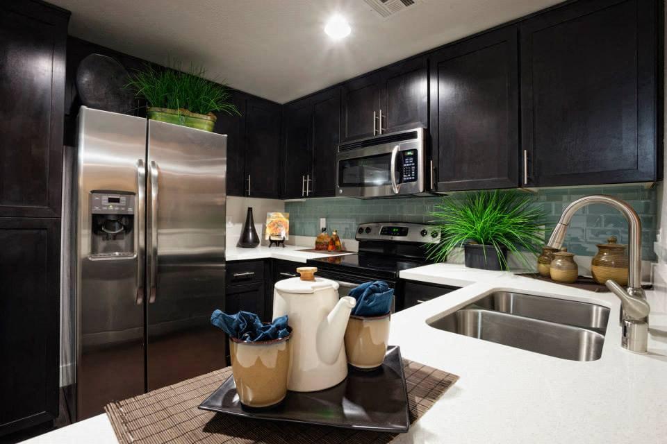 Fully equipped modern kitchen at The Legacy at Westwood, Los Angeles, provided by Los Angeles Luxury Furnished Housing with stainless steel appliances and stylish finishes.