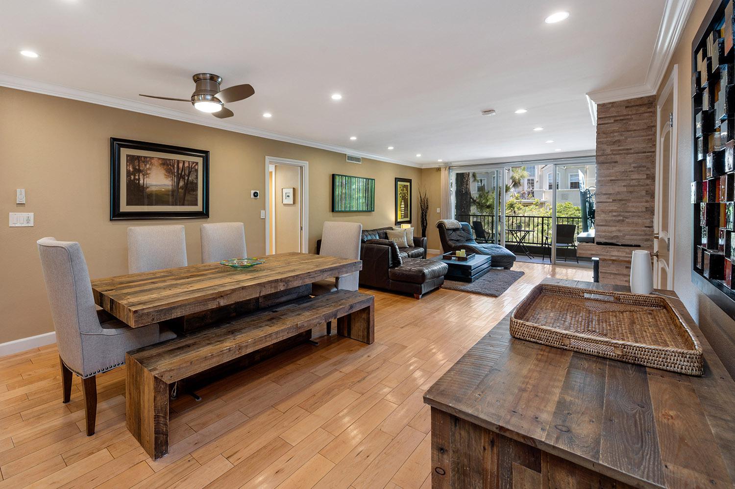 Stylish and fully furnished living room in a Brentwood apartment by Los Angeles Luxury Furnished Housing, featuring a sofa, smart TV, and elegant decor.